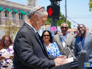 Jim McBeth's brother speaking at the dedication of the Jim Mcbeth Square